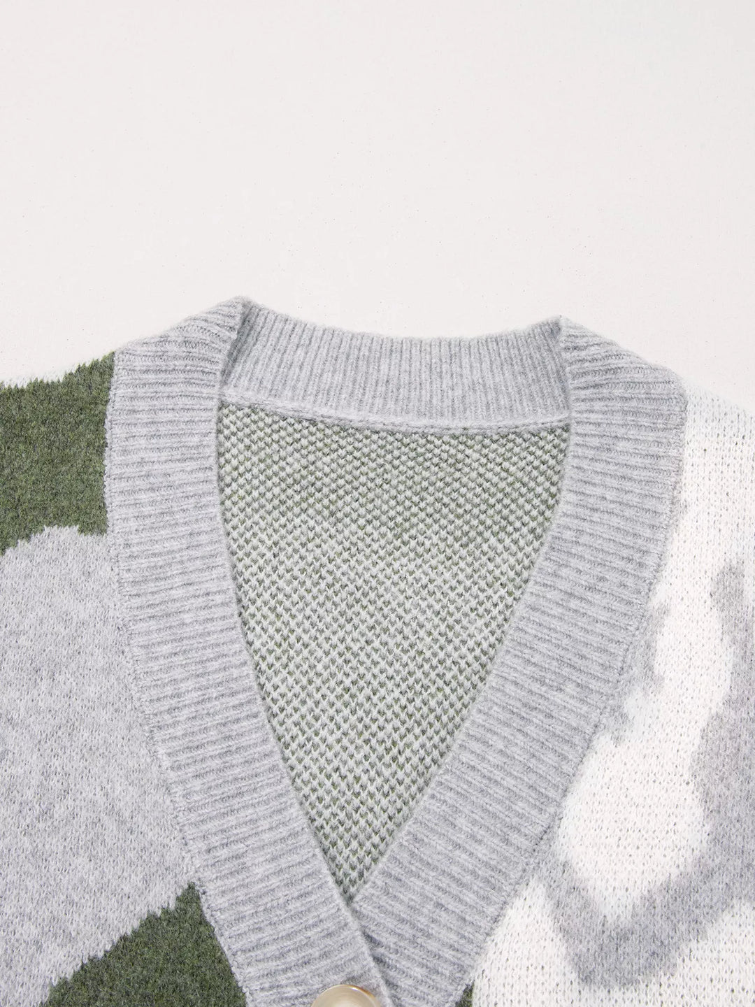 Camo knit drop shoulder cardigan with button front and pockets