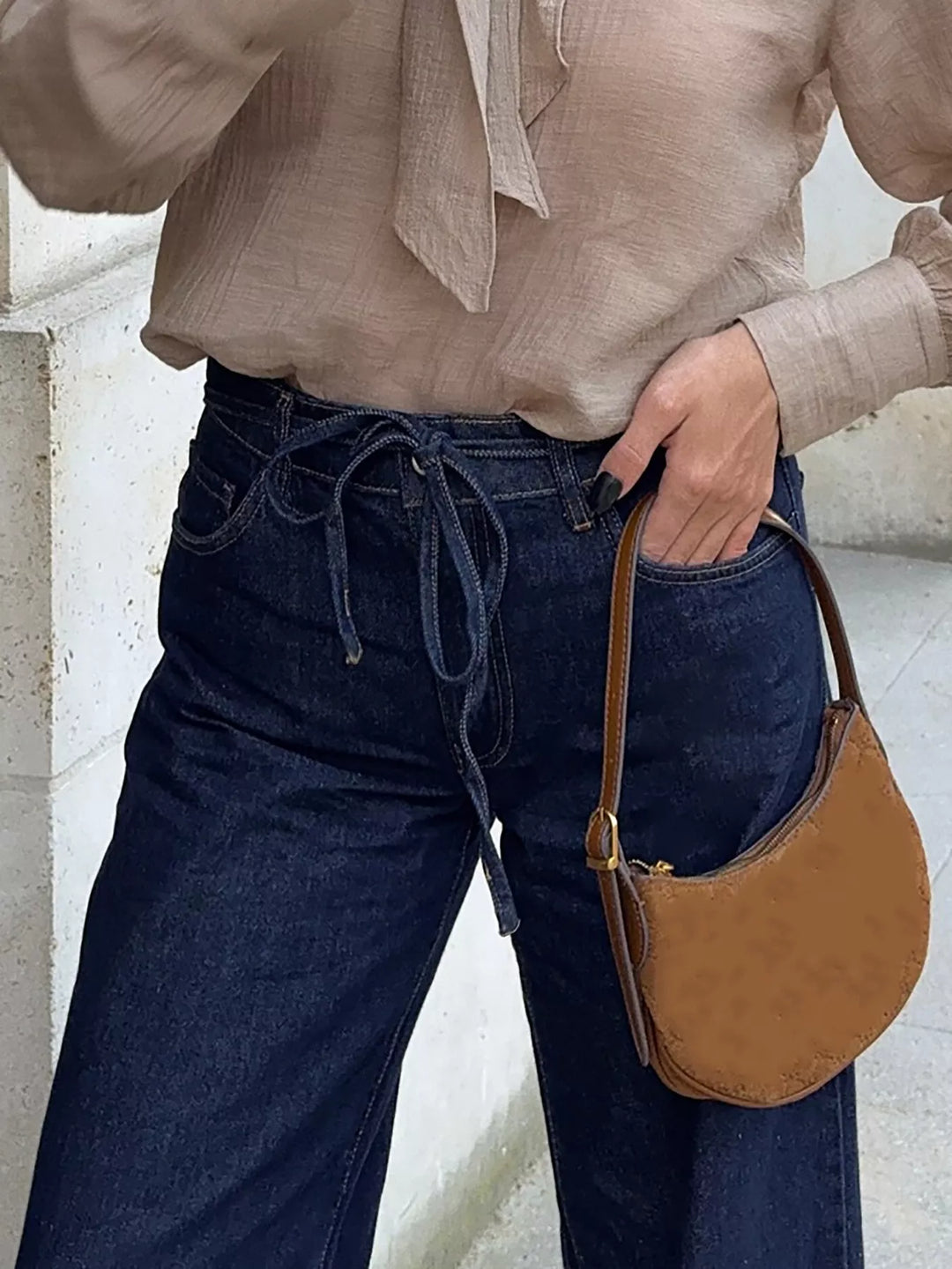 Tied-waist loose flare jeans in rigid cotton denim