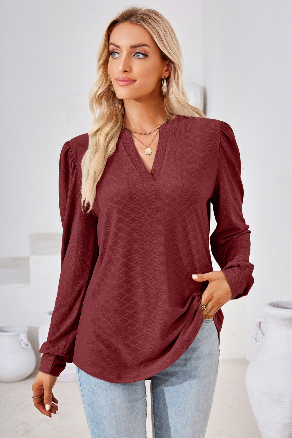 Textured knit split-neck puff sleeve blouse