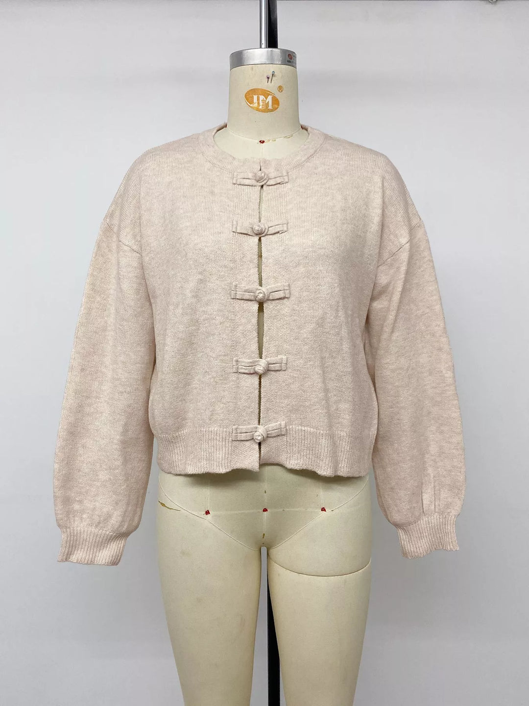 Knot button dropped shoulder knit cardigan