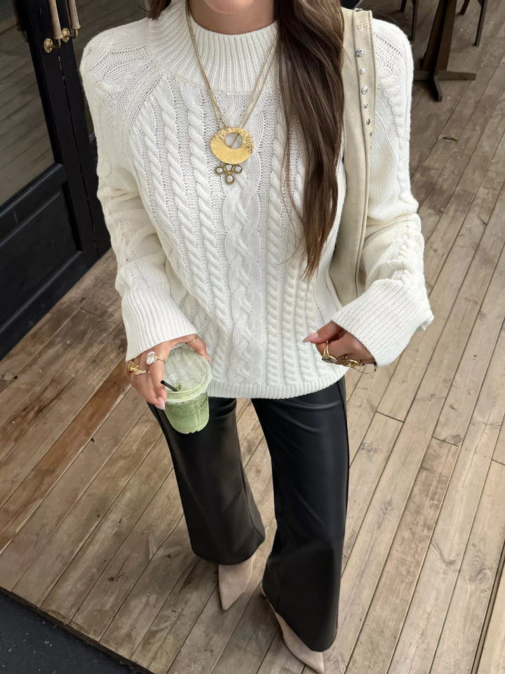 Cable-knit mock neck sweater with shoulder buttons