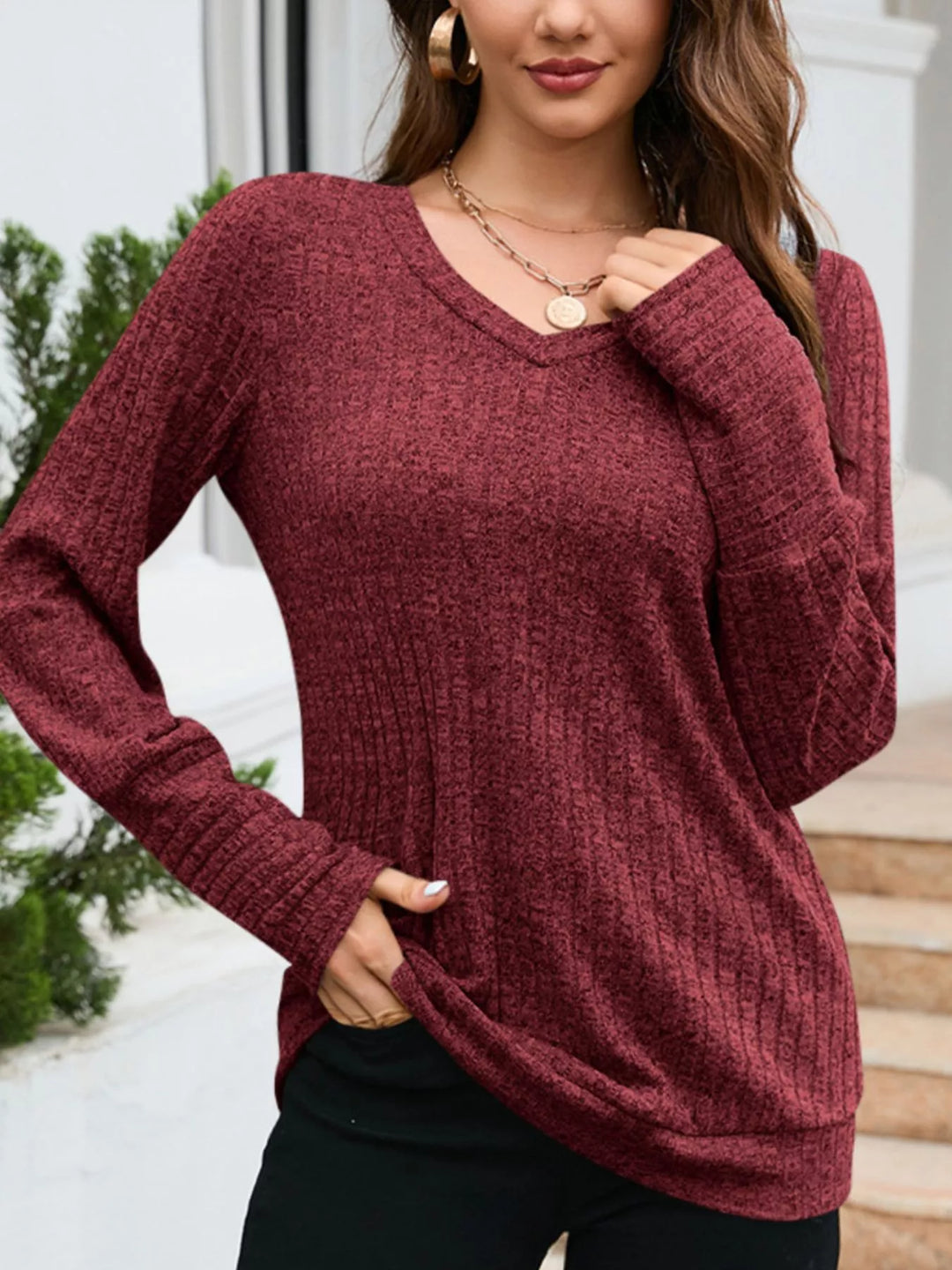 Red Ribbed knit V-neck long sleeve top with drop shoulders