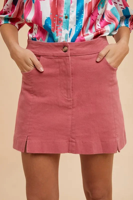 ROSE Stretch cotton mini skirt with side slits and front pockets
