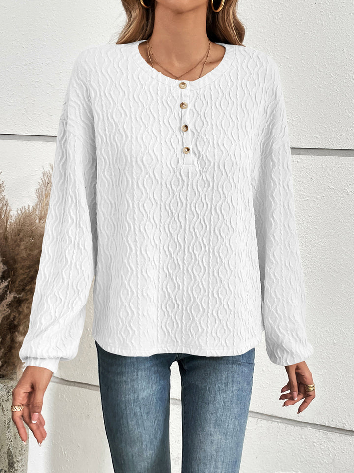 Textured half-button henley top with long sleeves