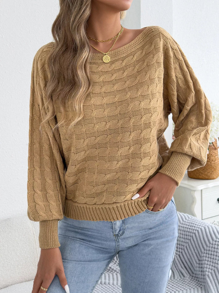 Cable knit boat neck sweater with dolman sleeves