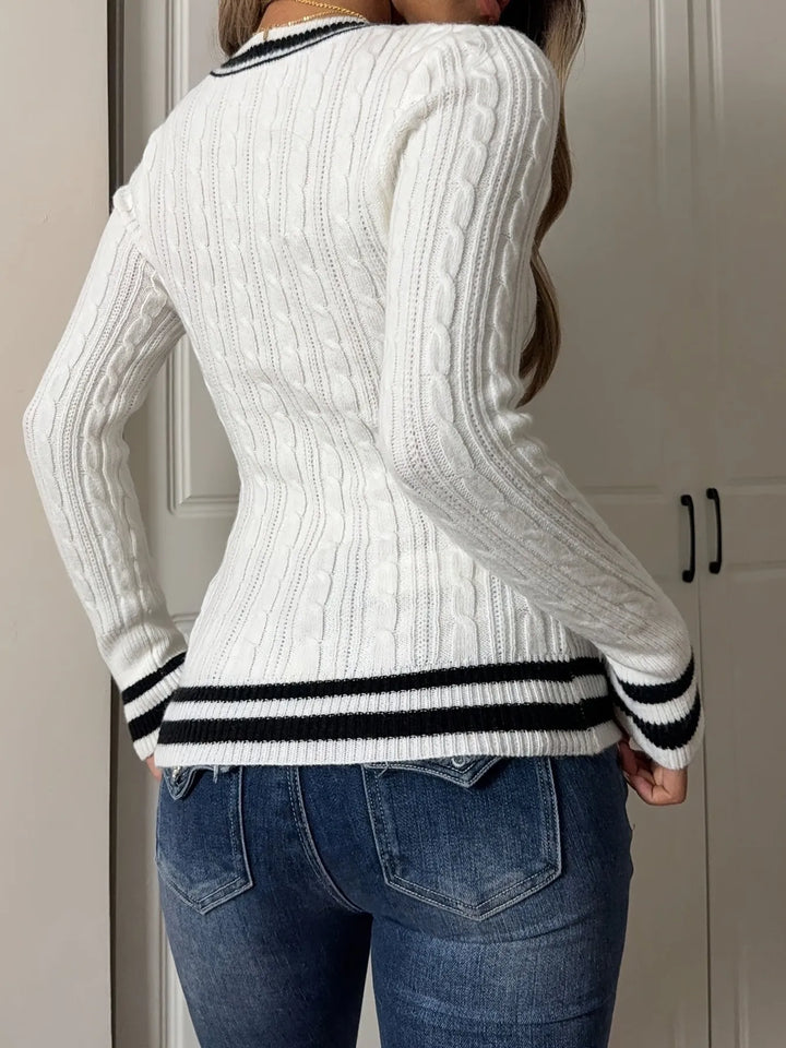 Cable knit V-neck sweater with varsity stripe trim