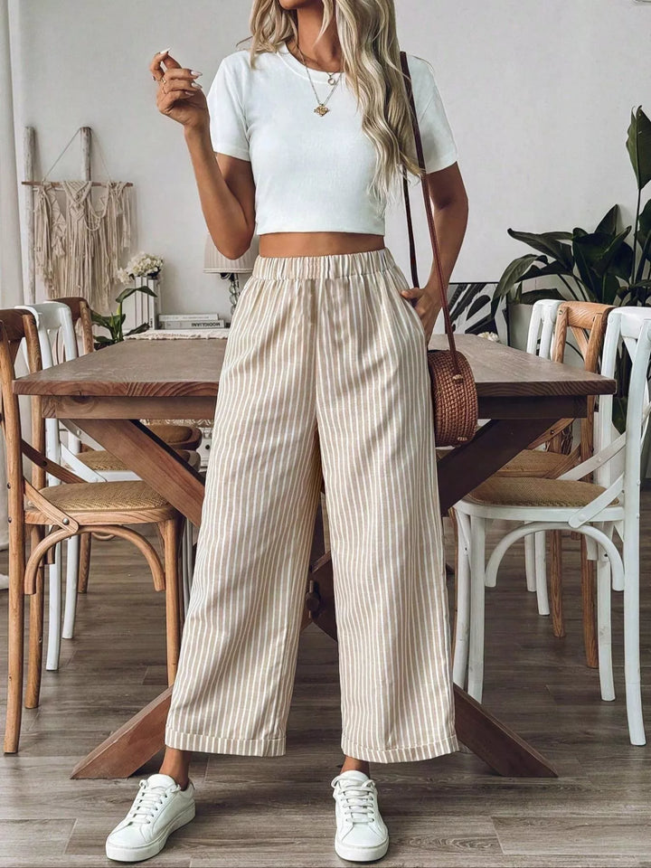 High-waisted pinstripe wide-leg pants with pockets