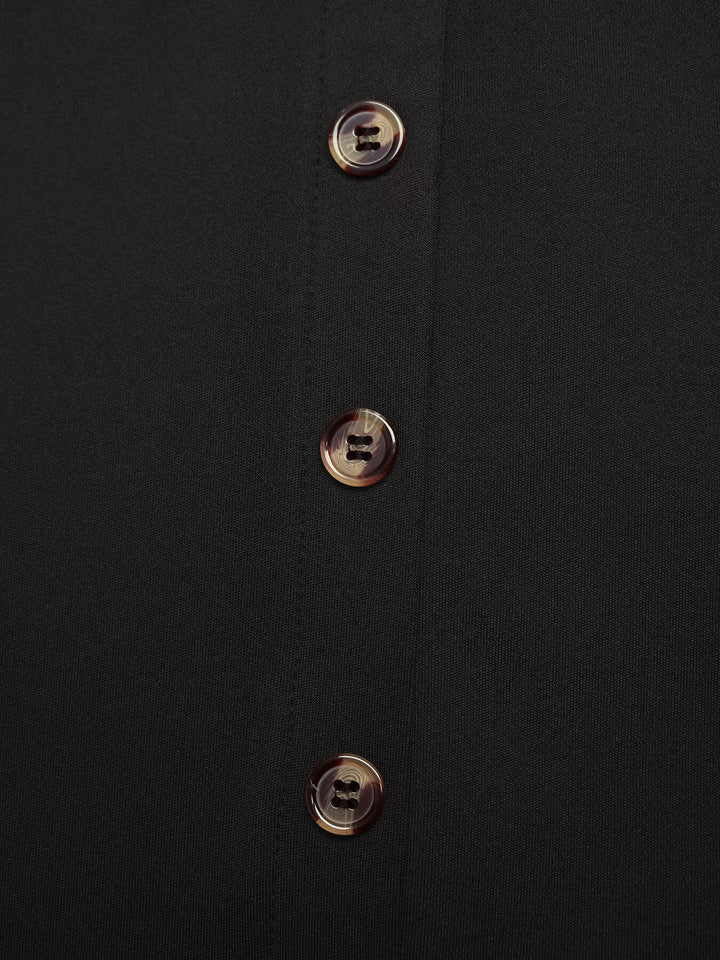 Button-front high-rise midi skirt with flap pockets and front slit