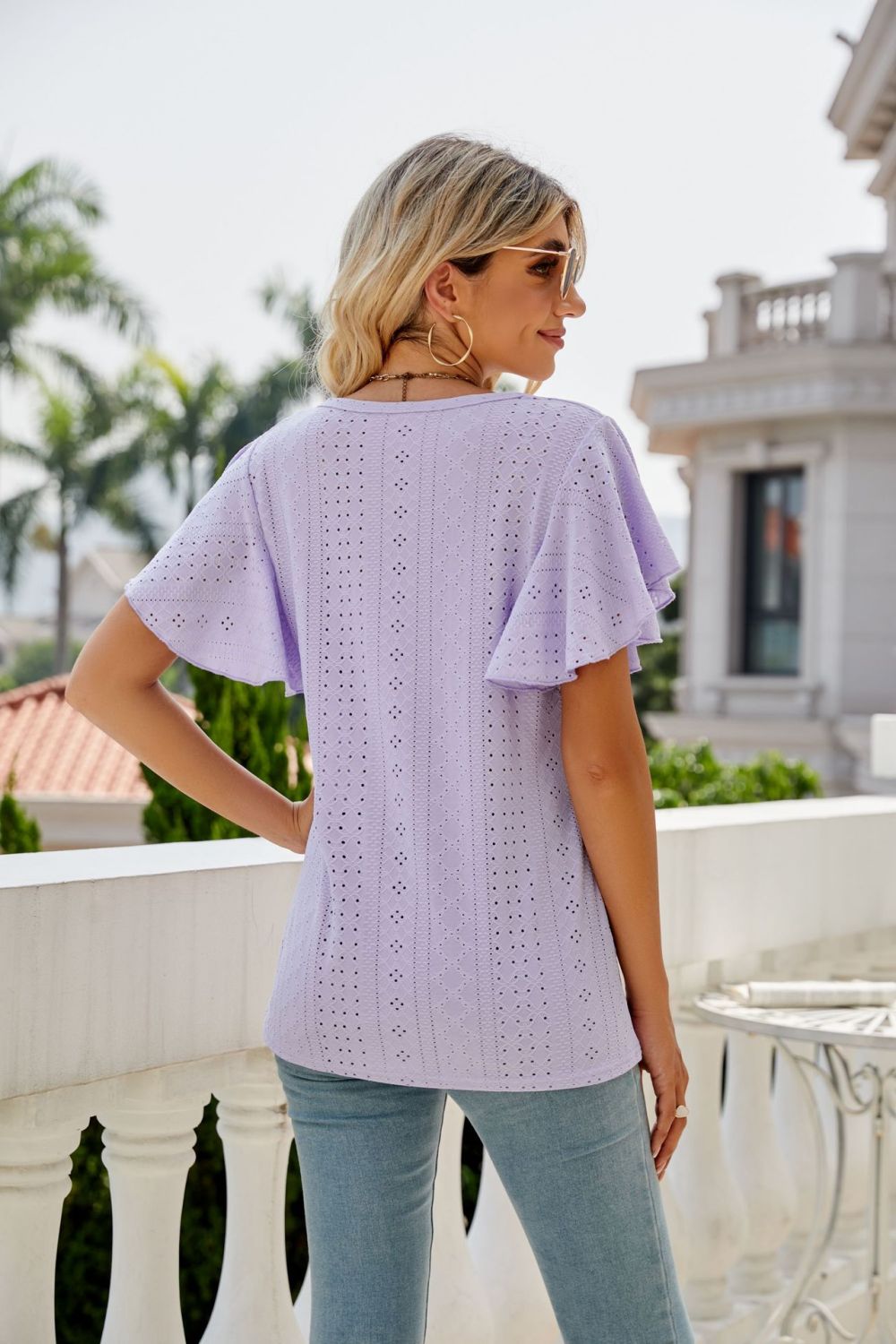 Eyelet knit flutter sleeve round neck top