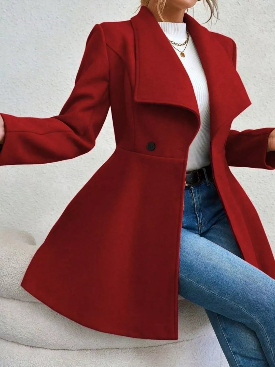 Wide lapel double-breasted flared coat with button tabs