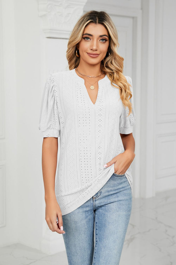 White Eyelet puff sleeve top with notched V-neck