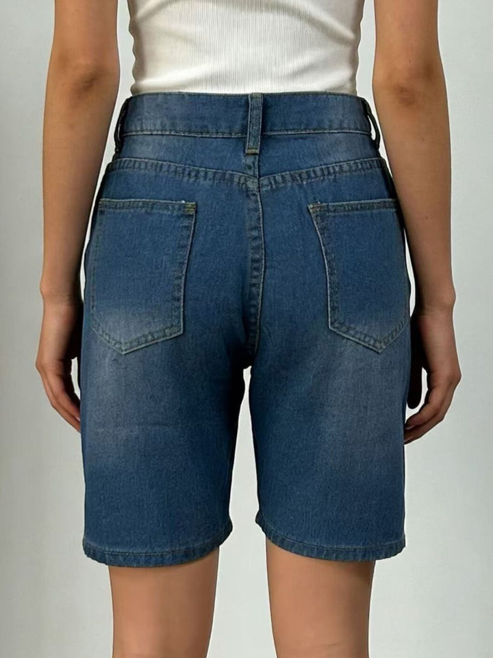 High-rise bermuda denim shorts with whiskered front