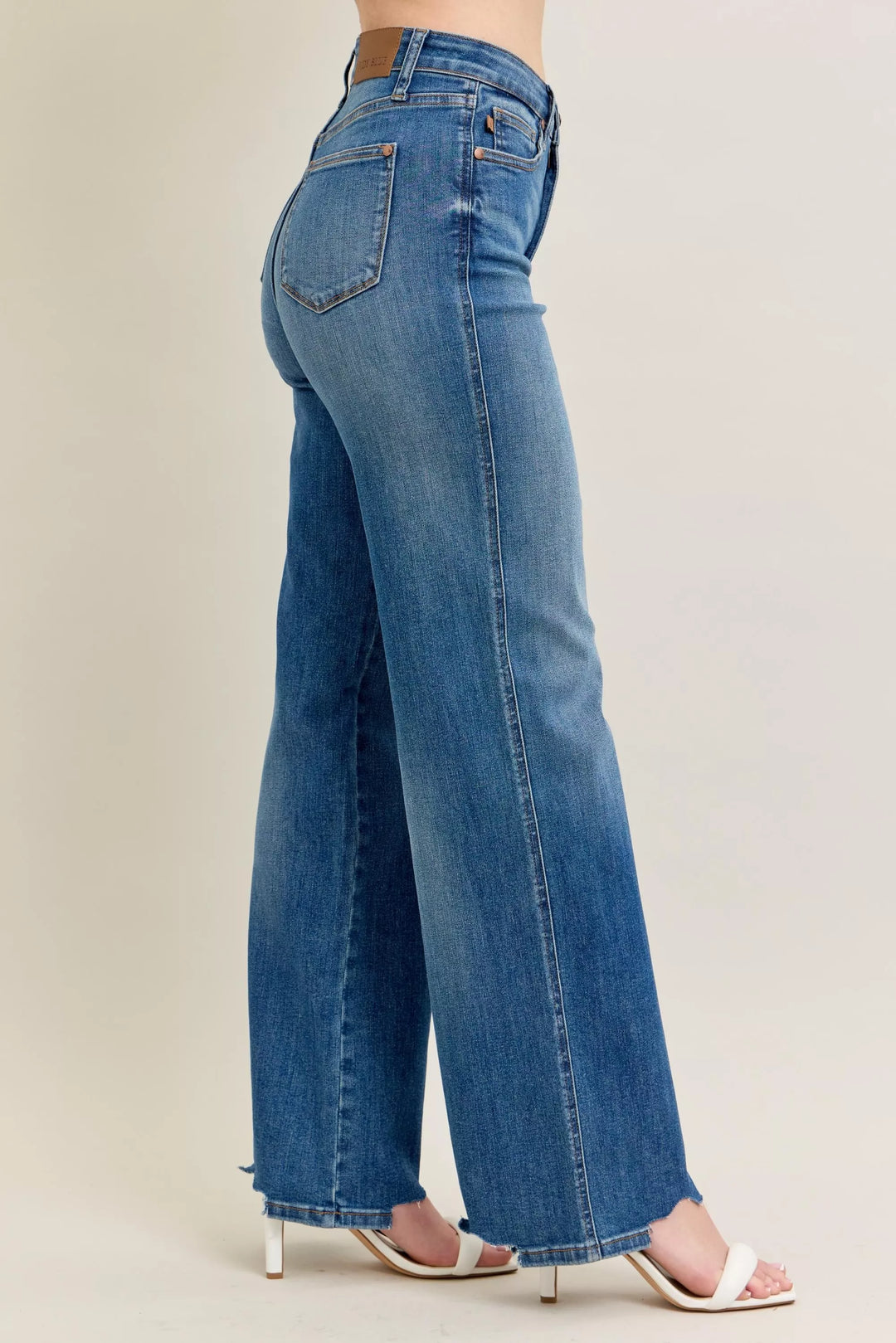High-rise tummy control wide leg jeans with raw chewed hem