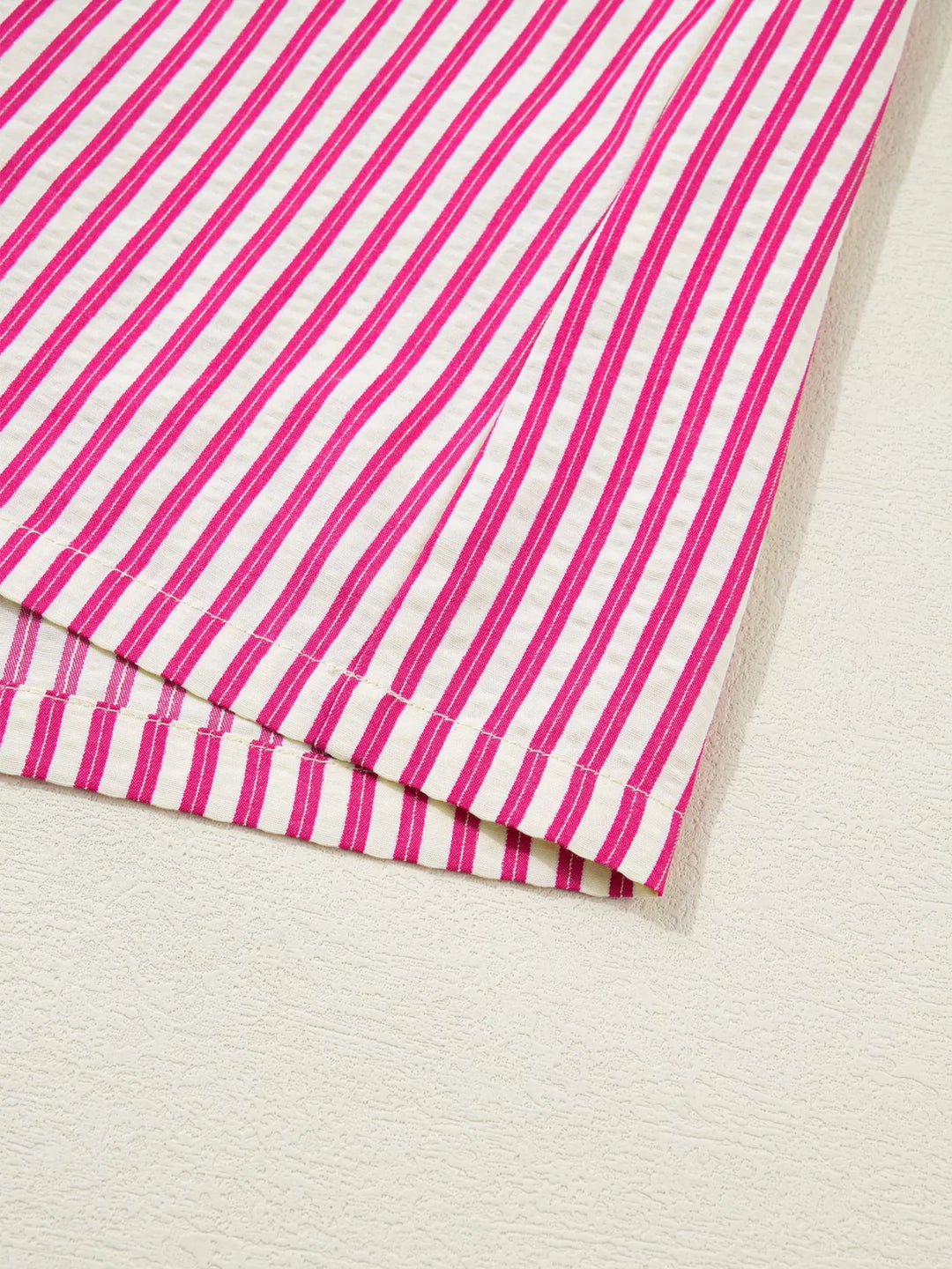 Striped shirred-yoke blouse with ruffled flutter sleeves
