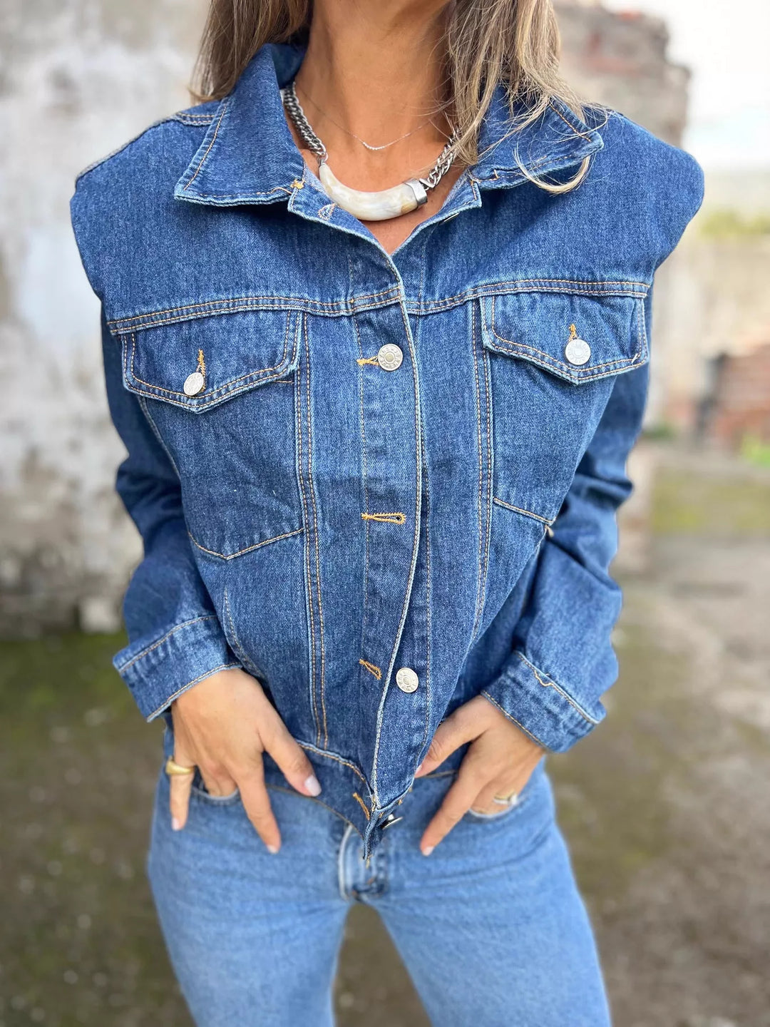Button-up denim jacket with buttoned chest pockets