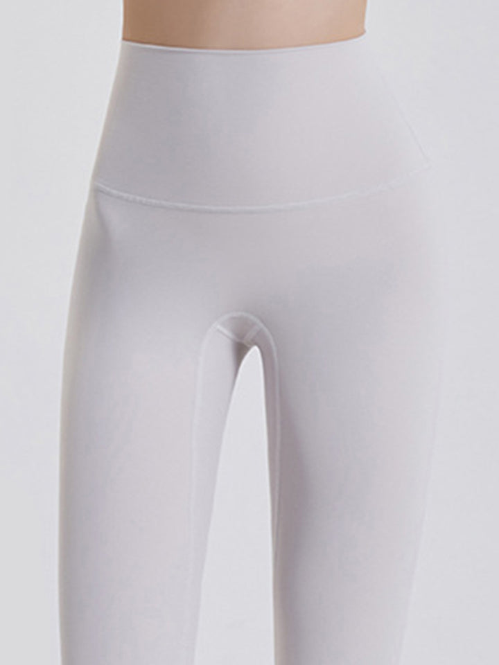 High-rise sports leggings with wide yoke waistband