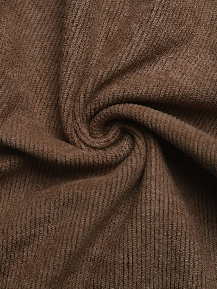 Wide-leg high-rise pants with button waist and deep pockets