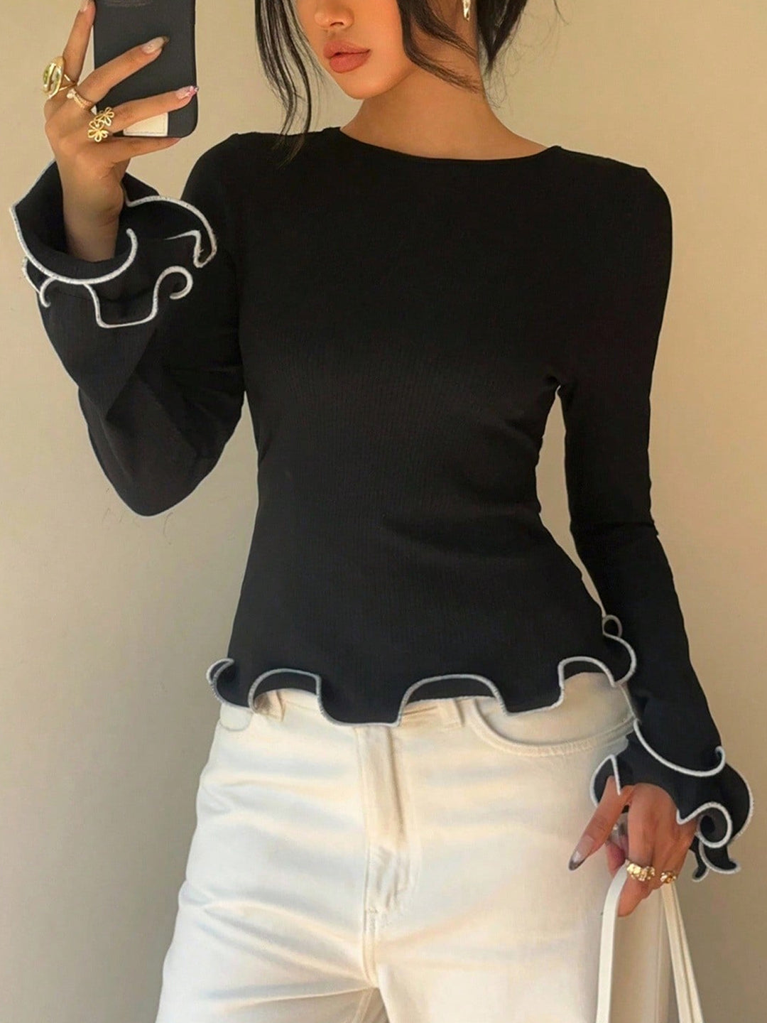 Ribbed lettuce-hem long sleeve top with tie back
