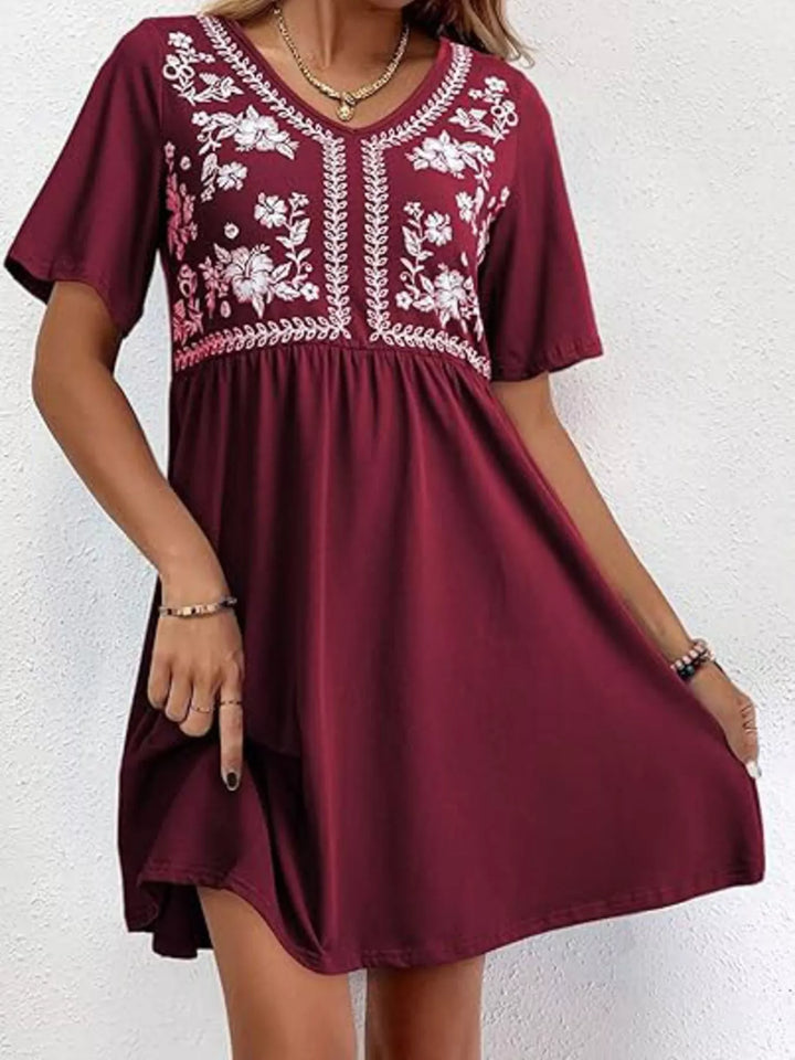Floral embroidered v-neck babydoll mini dress