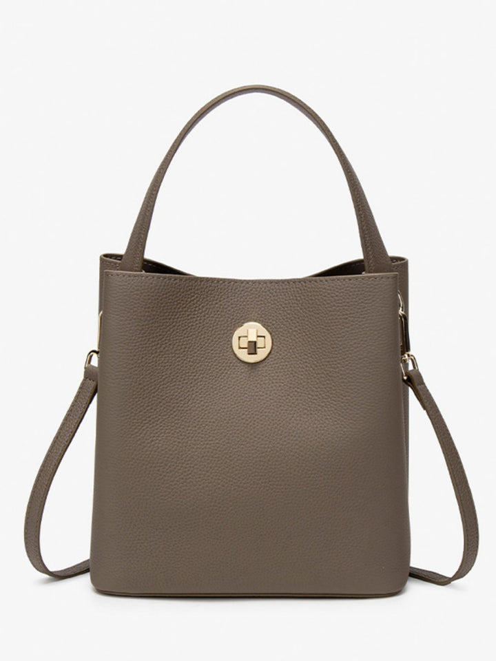 Pebbled faux leather bucket crossbody bag with twist lock