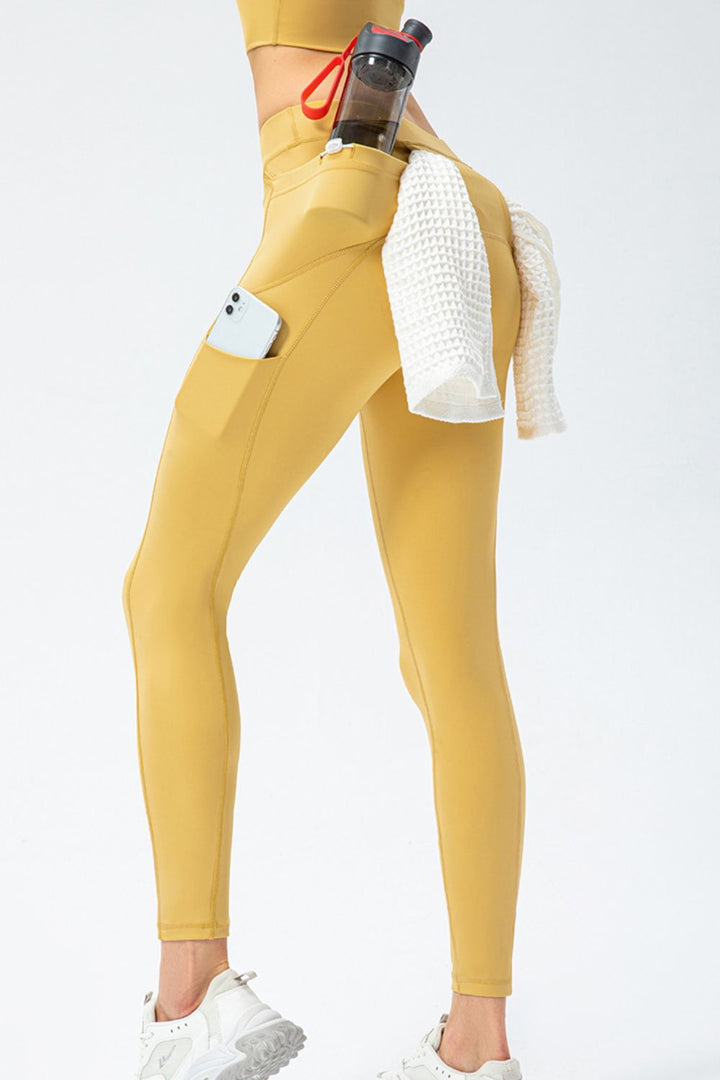 Gold High waist workout leggings with side phone pockets