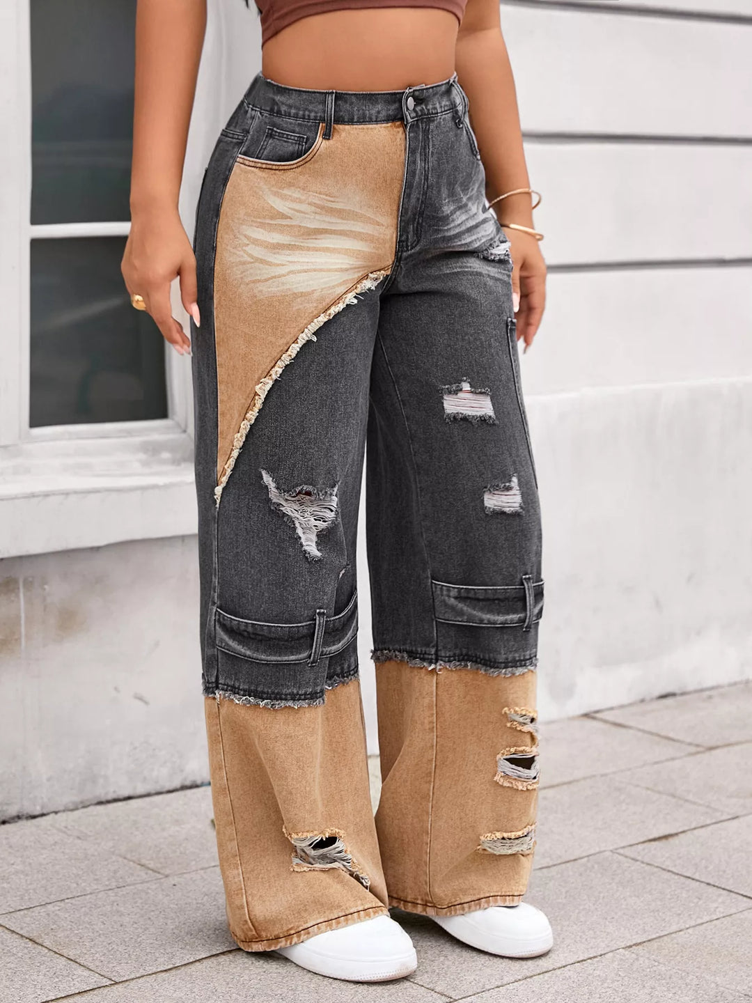 Distressed two-tone wide-leg jeans with raw-edge panels