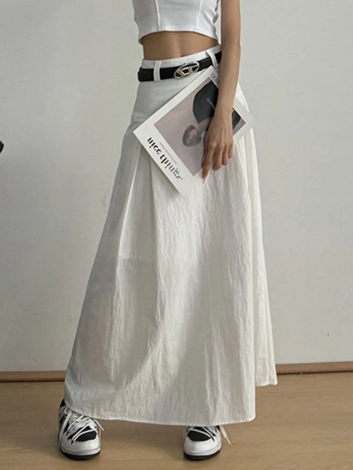 High-rise A-line maxi skirt with front pleats