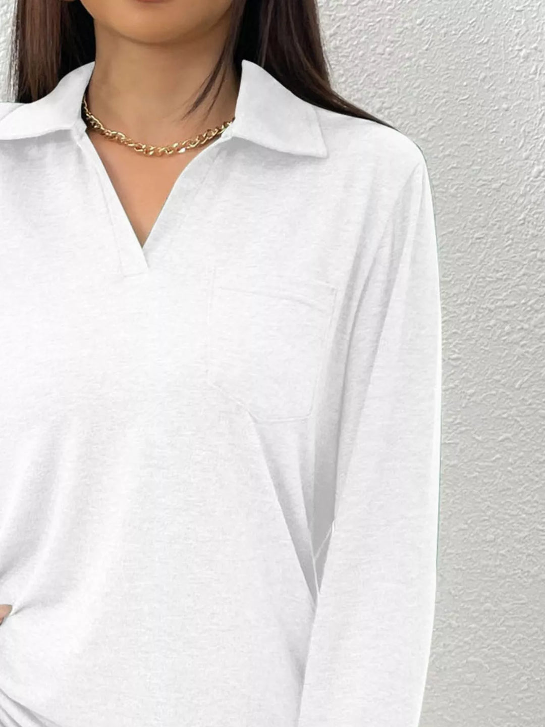 Collared long sleeve polo top with chest pocket