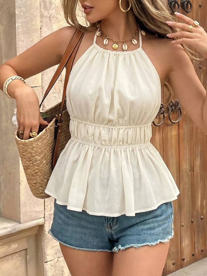 Halter neck peplum top with ruched waist