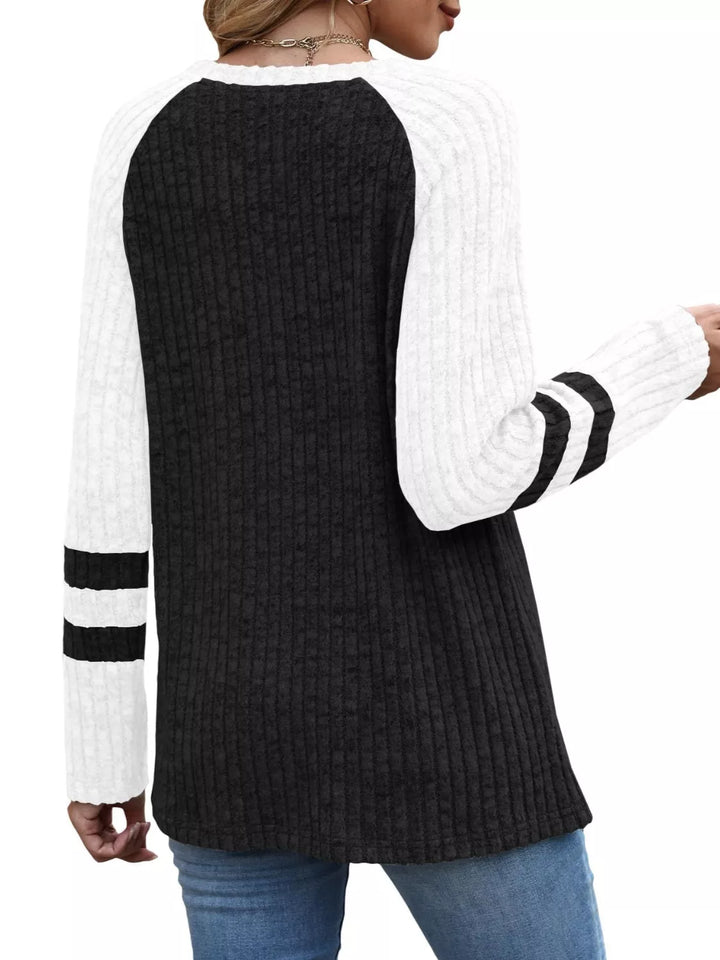 Ribbed knit raglan long sleeve top with varsity stripe sleeves