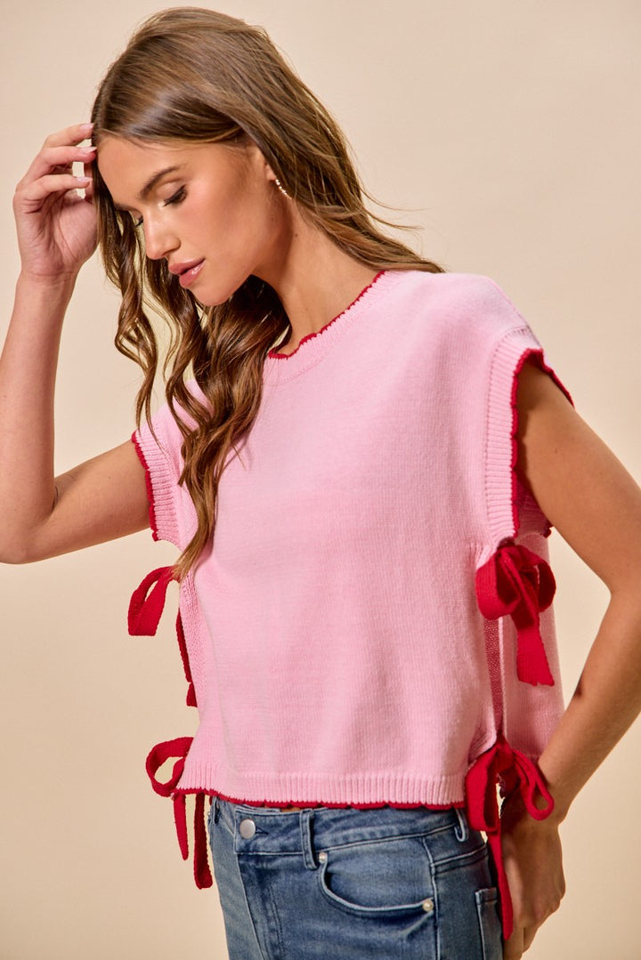Dolman sleeve knit sweater top with side ribbon ties