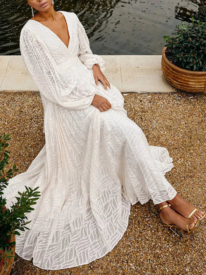 Textured V-neck balloon sleeve maxi dress with twist front