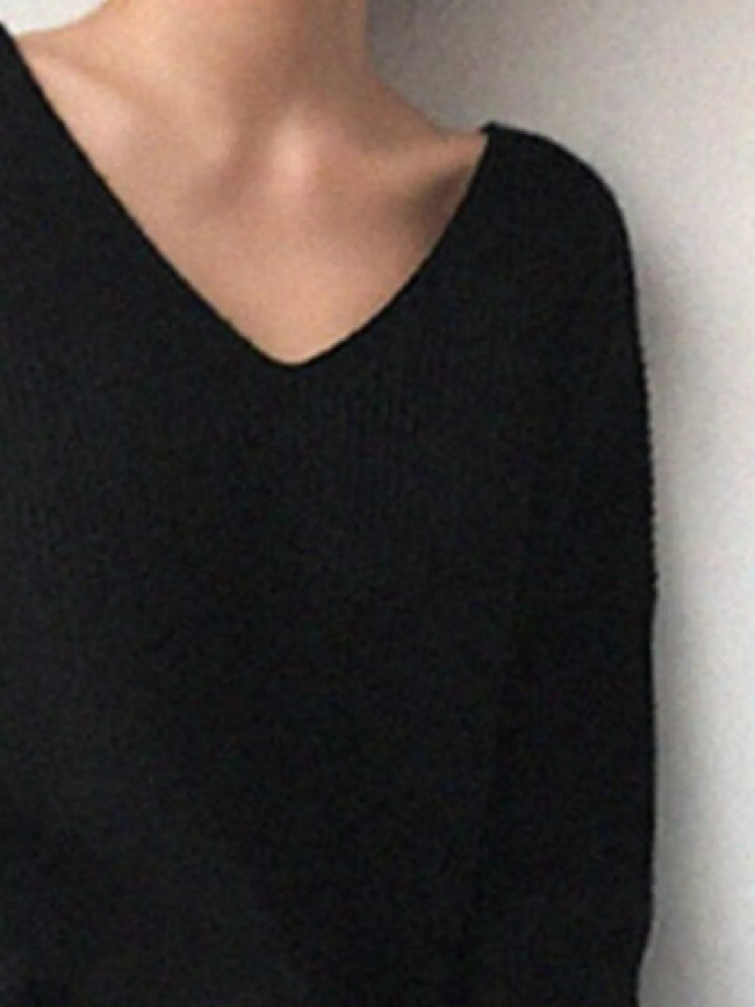 Ribbed knit V-neck sweater with dropped shoulders