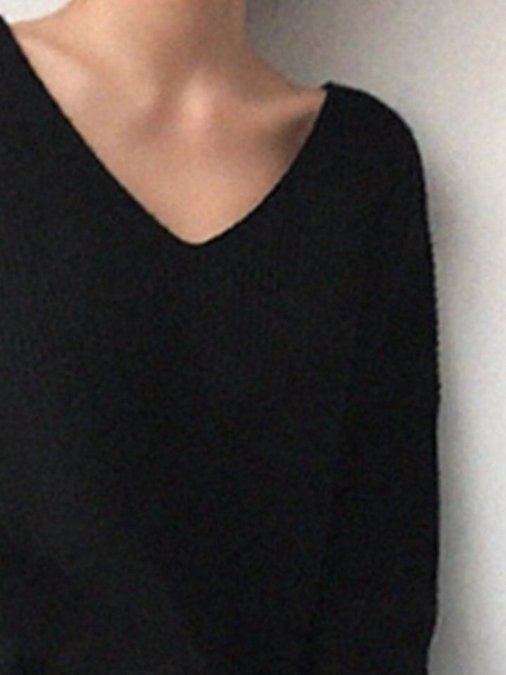 Ribbed knit V-neck sweater with dropped shoulders