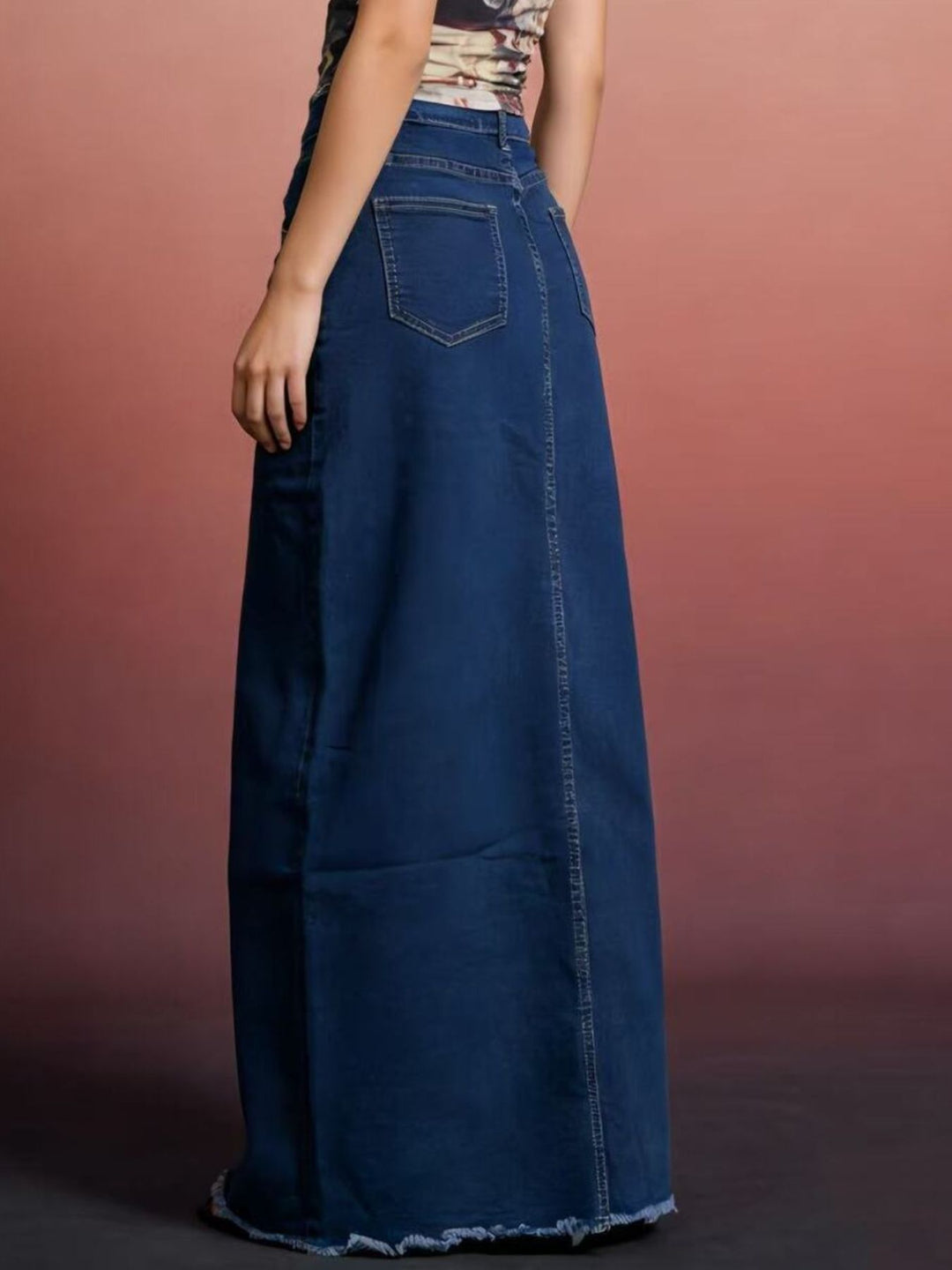 Raw hem maxi denim skirt with button closure and front pockets