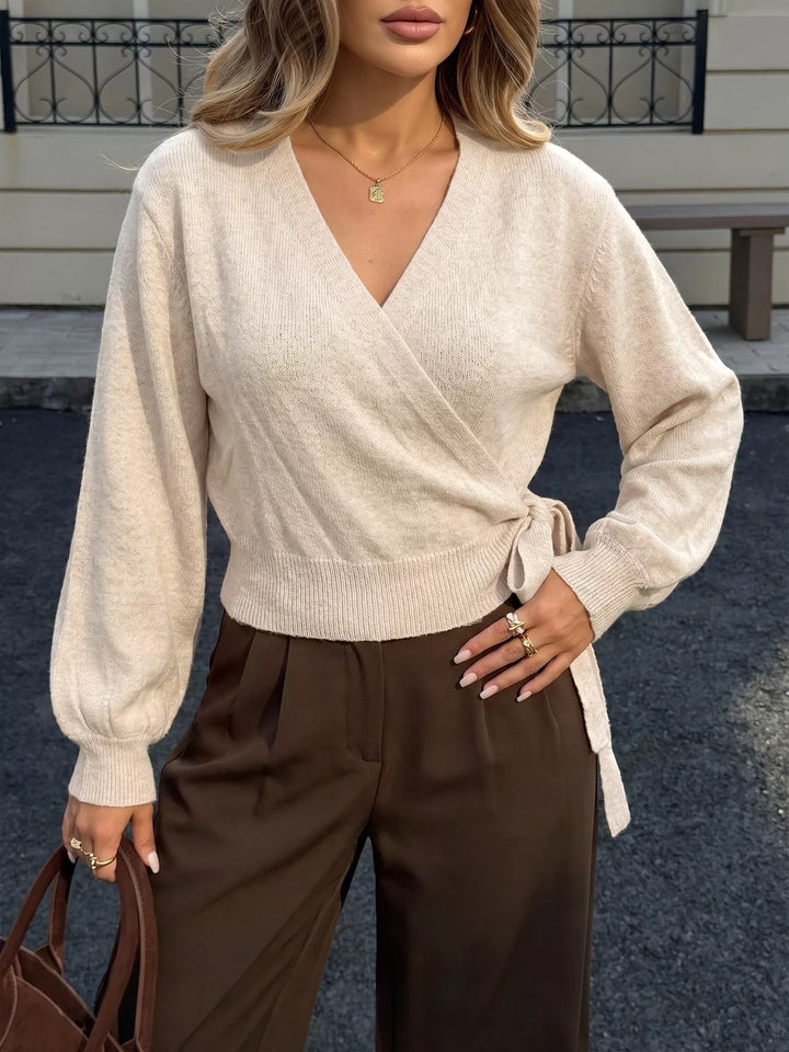 Surplice wrap sweater with side tie and drop shoulders