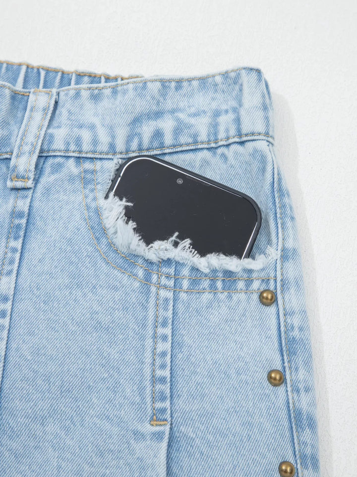 Studded wide leg jeans with side slits and frayed hem