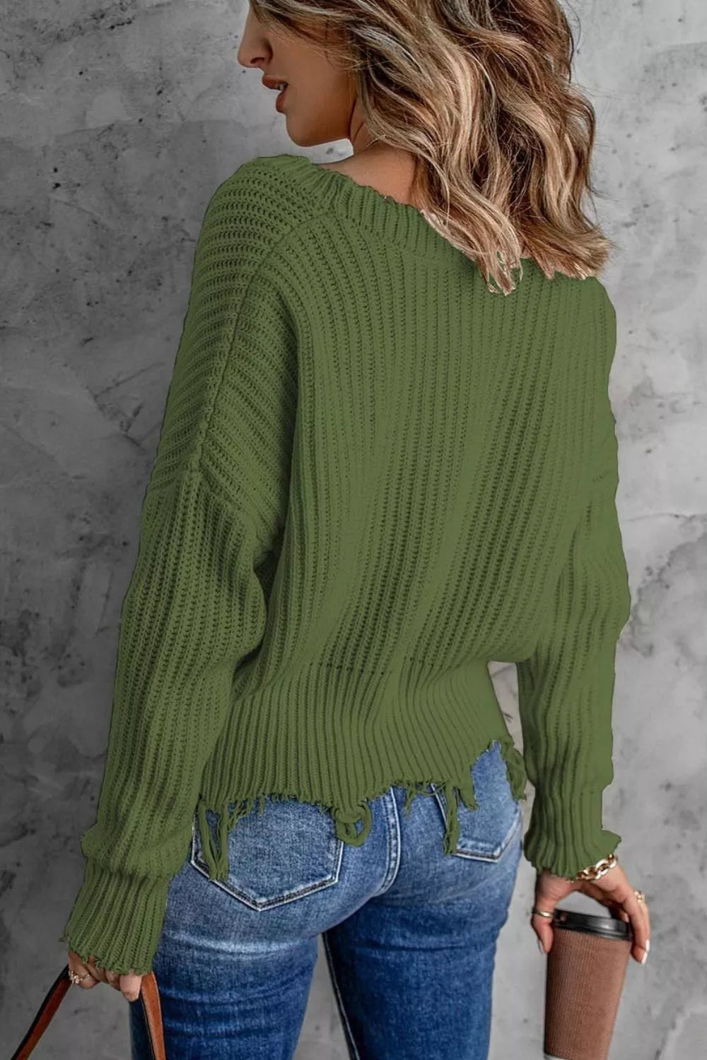 Distressed raw hem ribbed knit V-neck sweater