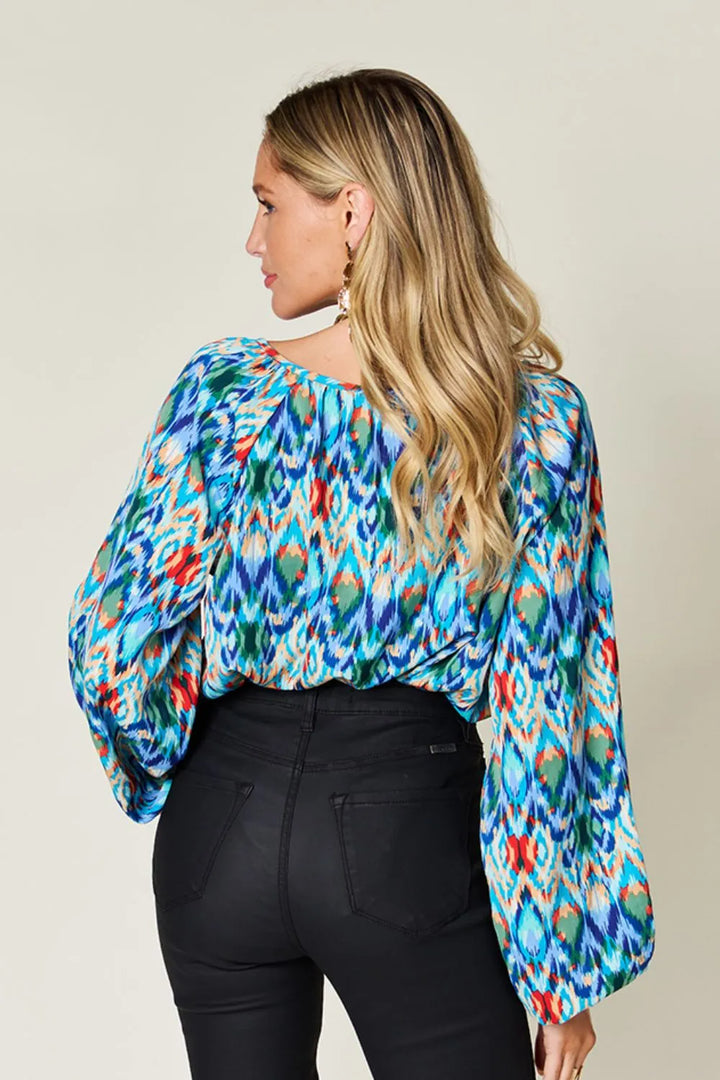 Abstract print balloon sleeve blouse with split neck