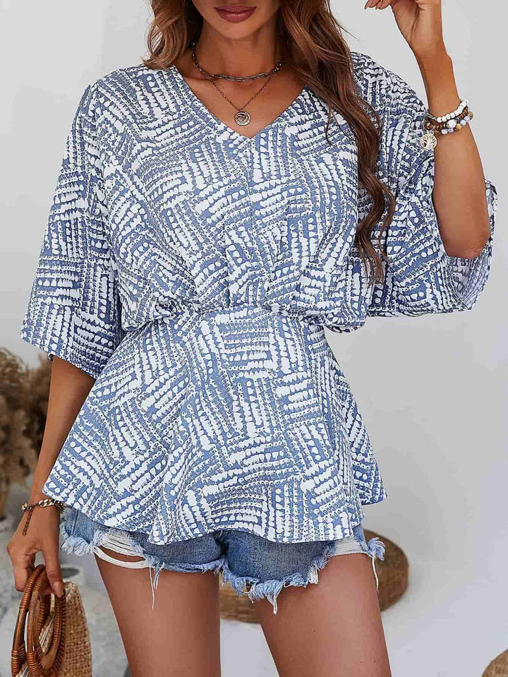 Abstract print V-neck dolman sleeve blouse
