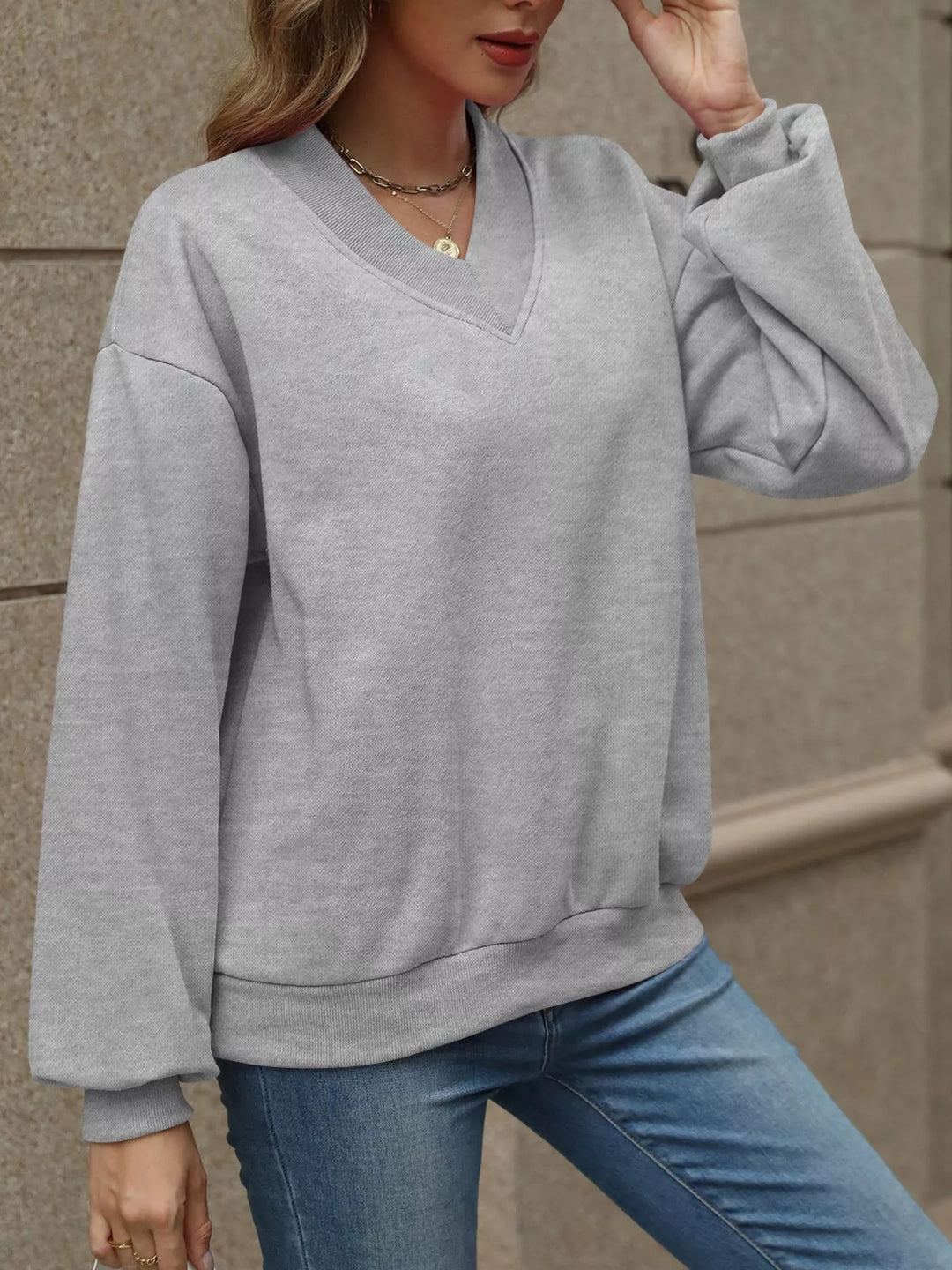 V-neck drop-shoulder pullover sweatshirt with ribbed trim