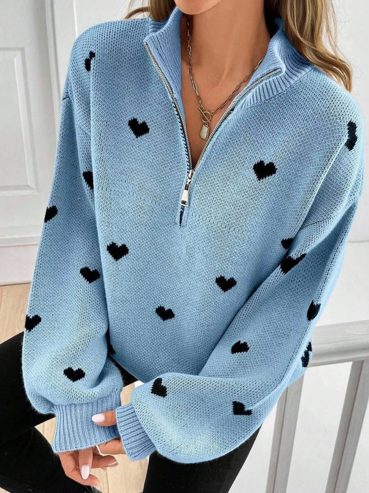 Heart print half-zip mock neck sweater with drop shoulders