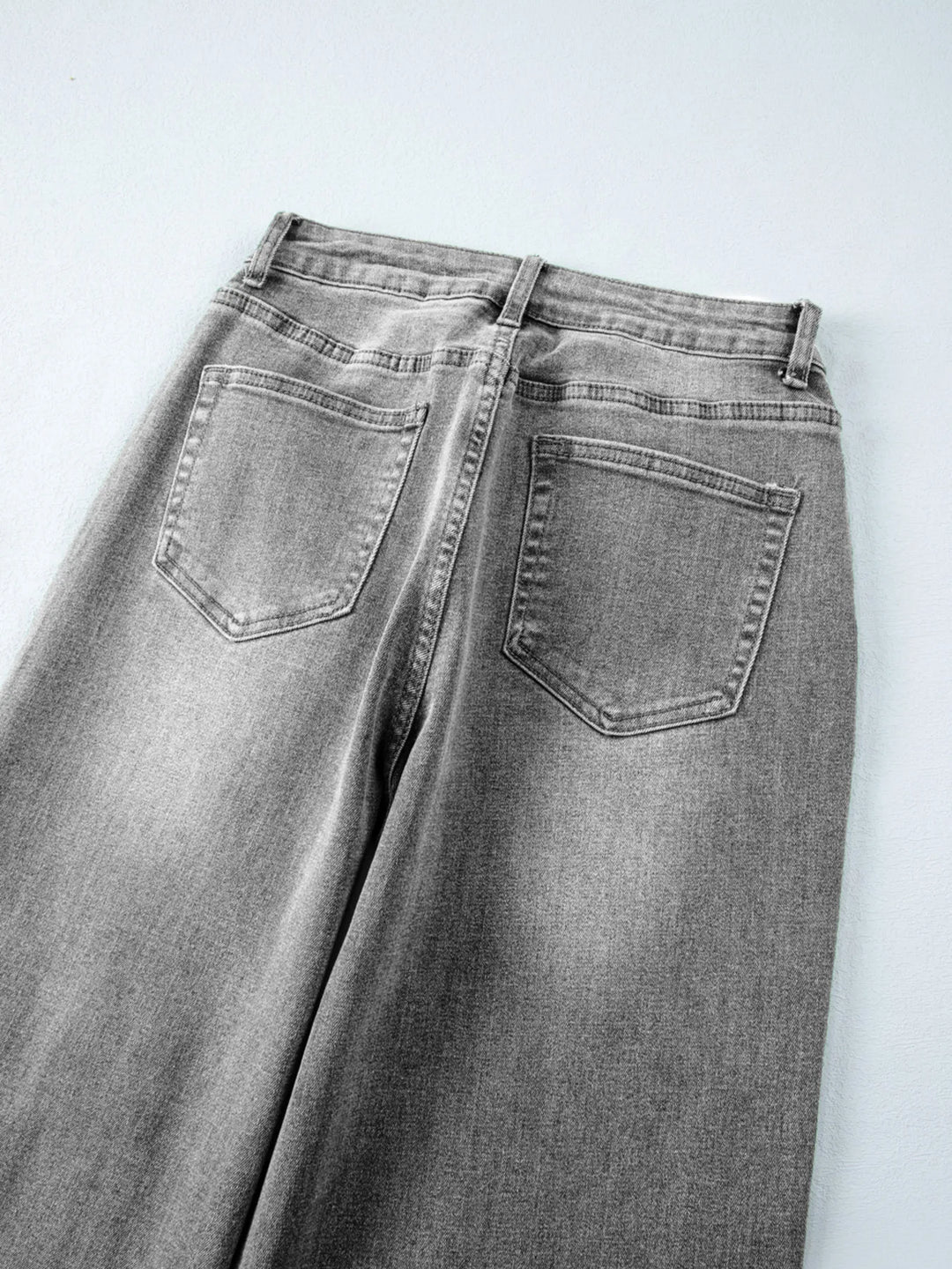 High-rise wide-leg jeans with released hem