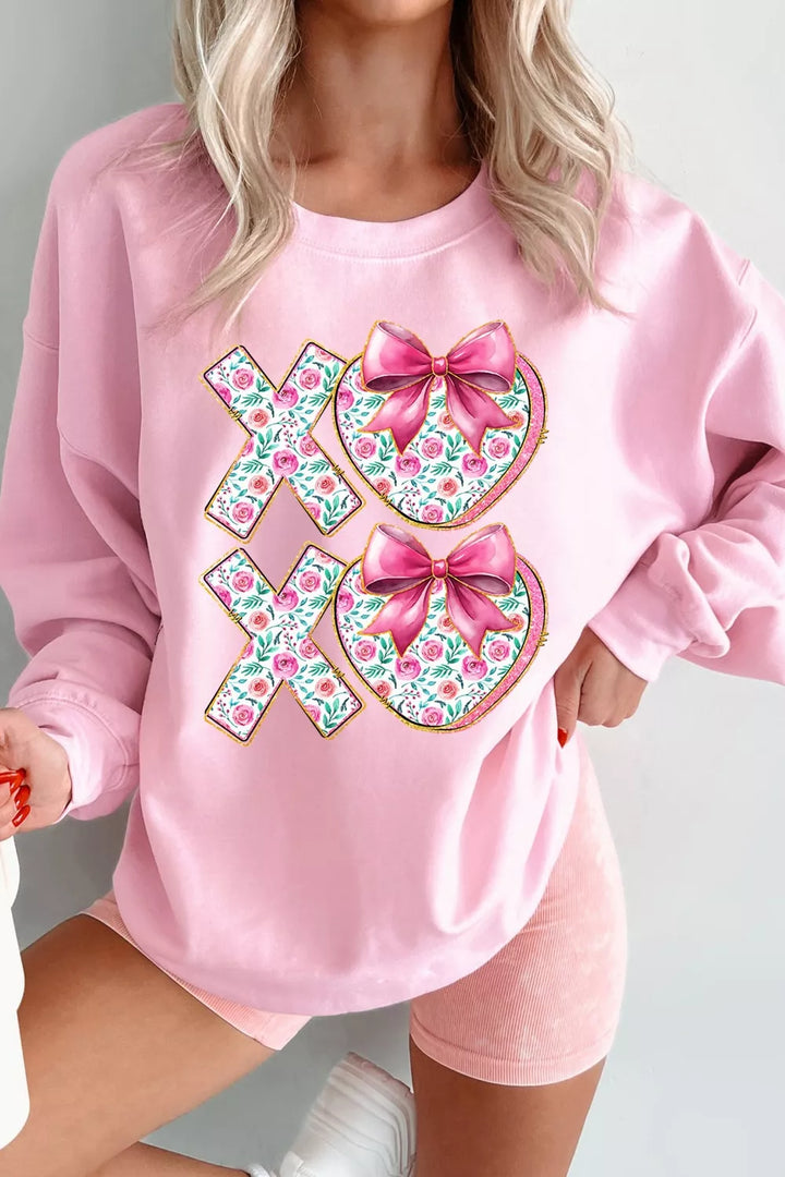 Blush Pink Floral XOXO graphic crewneck sweatshirt with bow hearts