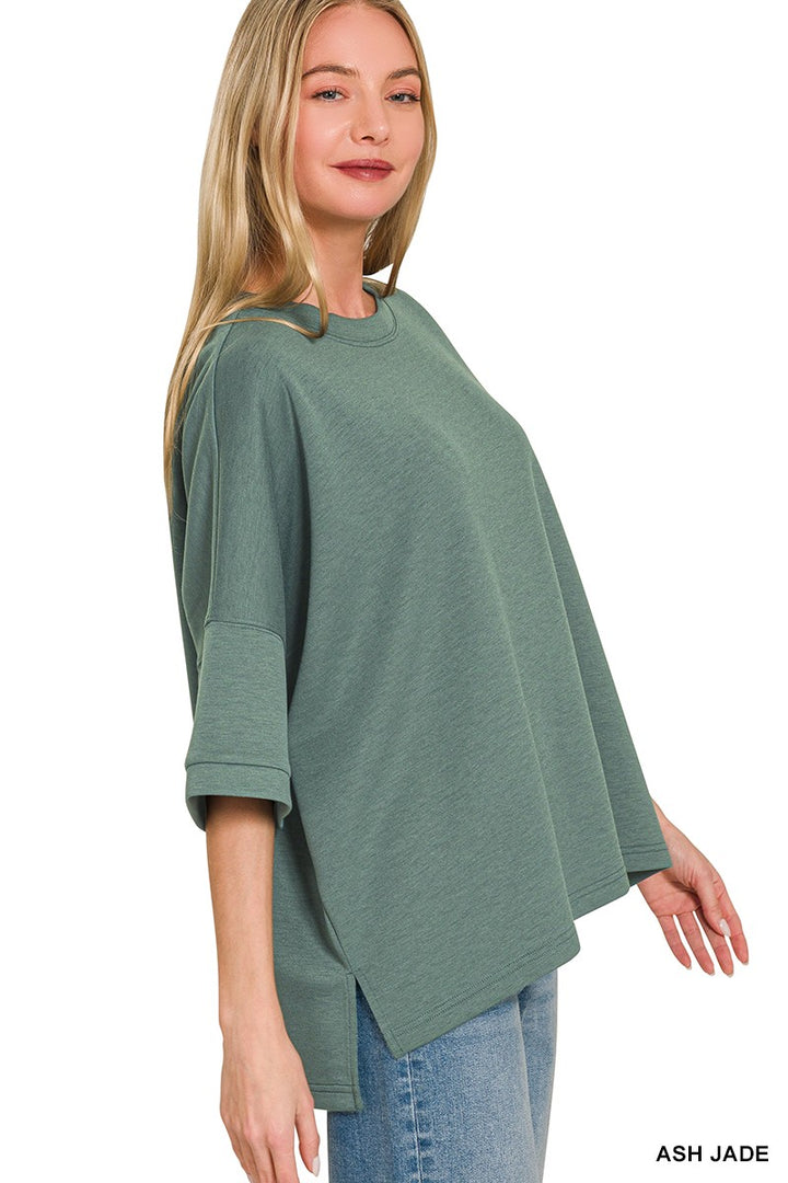 Boxy scuba knit round neck top with side slits