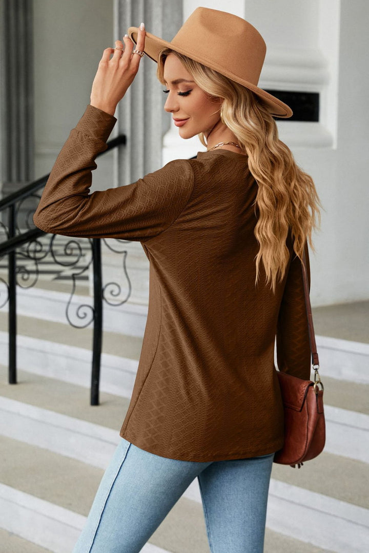 Textured knit long sleeve top with button placket