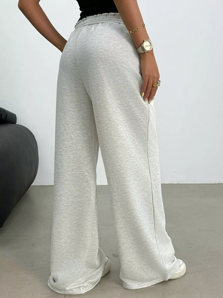 Wide-leg drawstring sweatpants with ruffled elastic waist