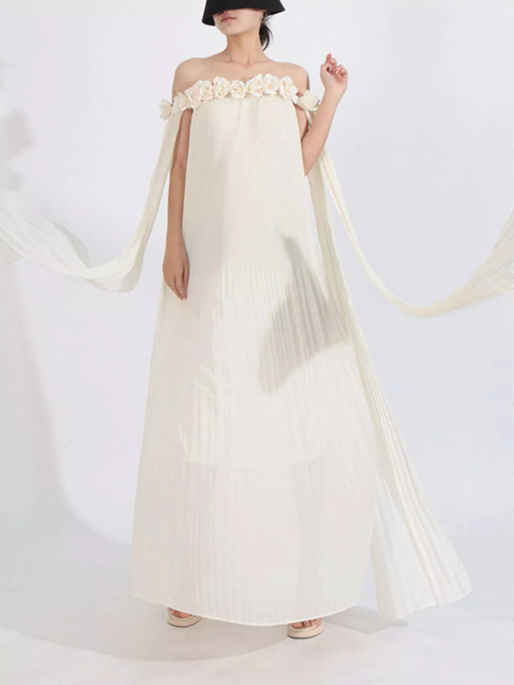 Off-shoulder pleated maxi dress with rosette neckline