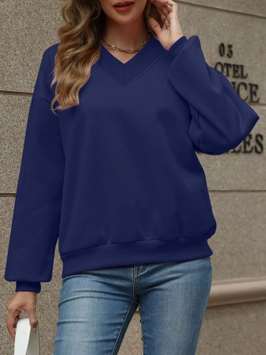 V-neck drop-shoulder pullover sweatshirt with ribbed trim