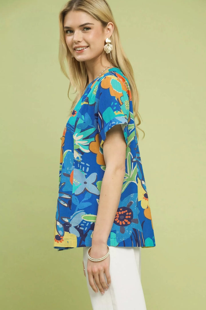 Abstract floral pleated blouse with keyhole back